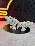 White 3d printed T REX articulated