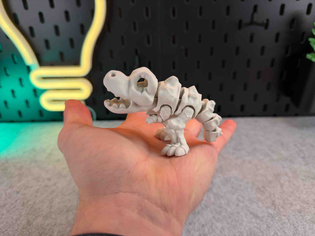 White 3d printed T REX articulated