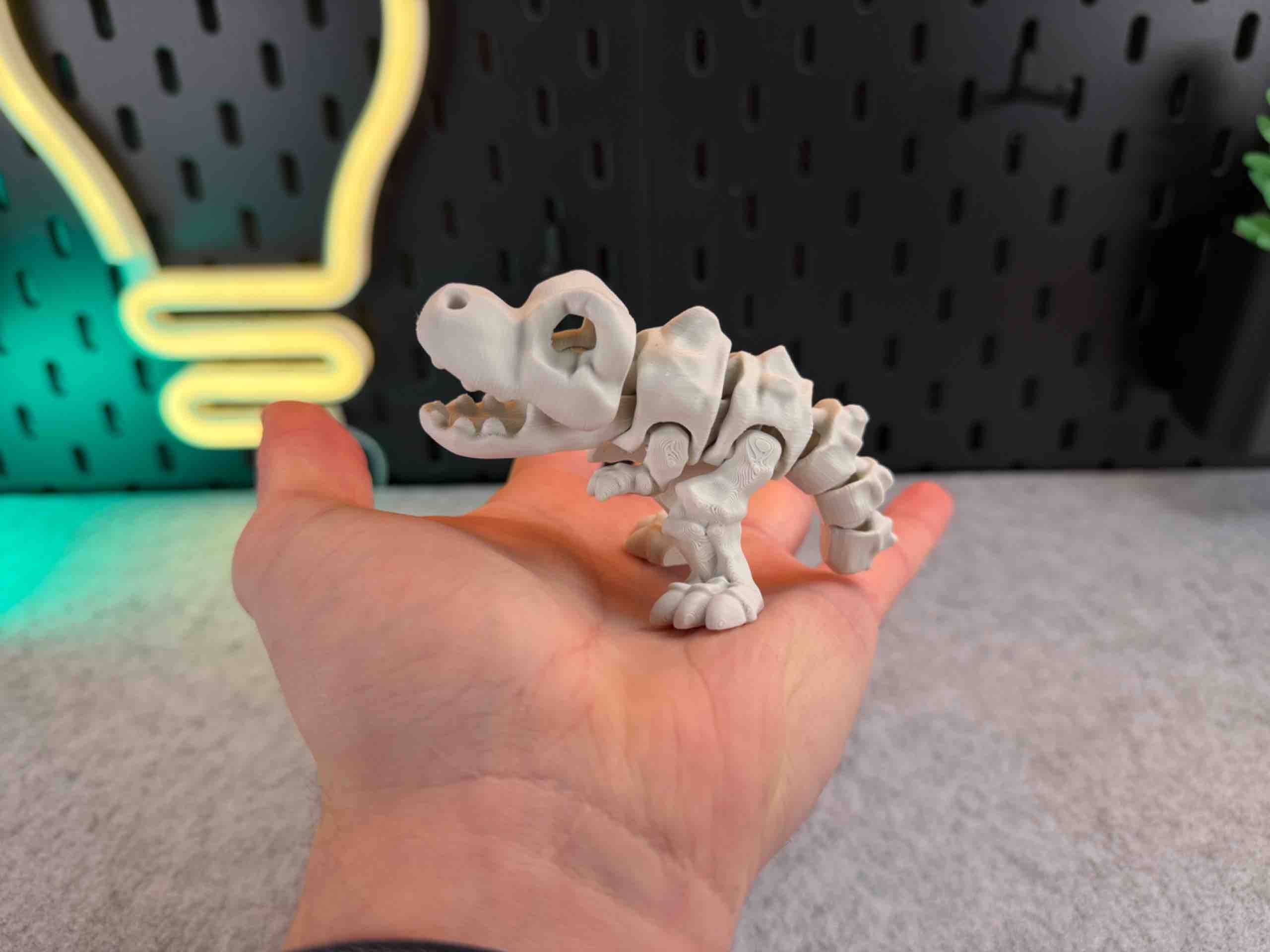 White 3d printed T REX articulated