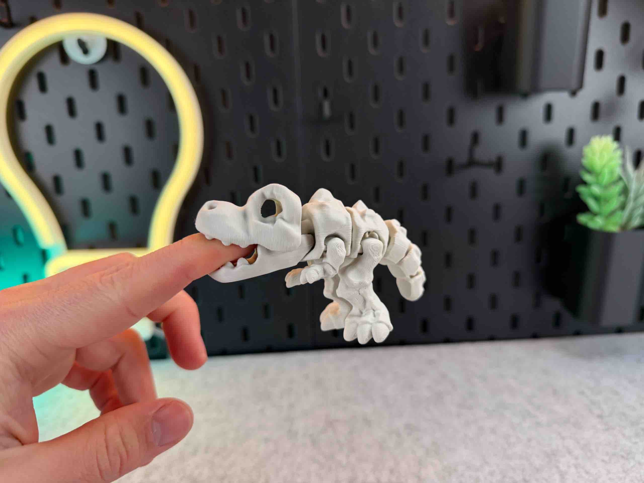 White 3d printed T REX articulated